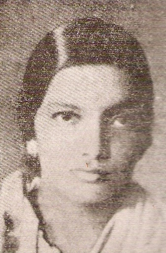 Archival halftone portrait of Kalpana Datta as a young woman, head and shoulders, looking slightly away from the camera.